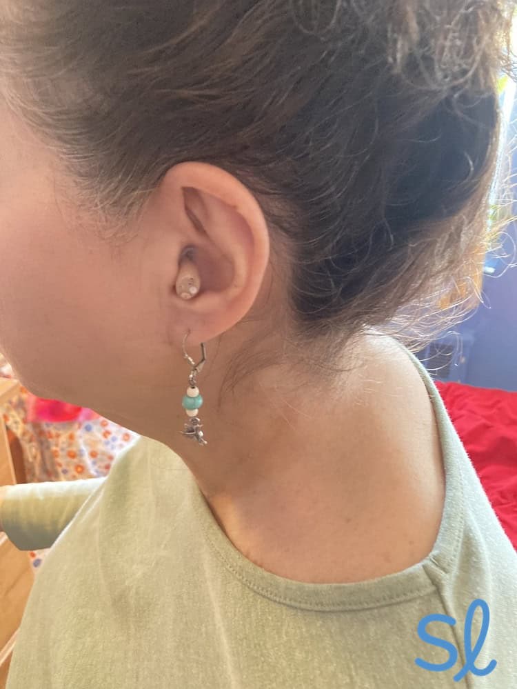 Wearing MDHearing s NEO XS PRO hearing aids